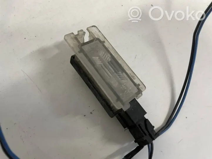 Renault Megane I Lampa oświetlenia tylnej tablicy rejestracyjnej 7700282921