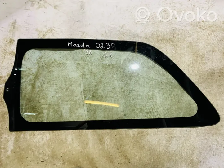 Mazda 323 Galinis šoninis kėbulo stiklas 