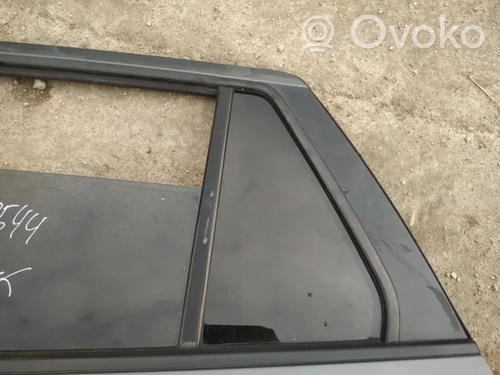 Hyundai Santa Fe Ventanilla de ventilación de la puerta trasera 