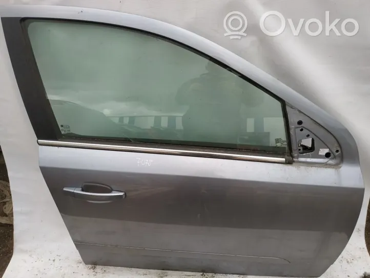 Opel Astra H Drzwi przednie melynos