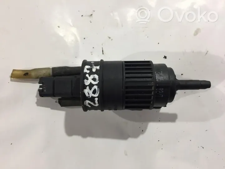 Nissan Almera N16 Pompa spryskiwacza szyby przedniej / czołowej 7700430702