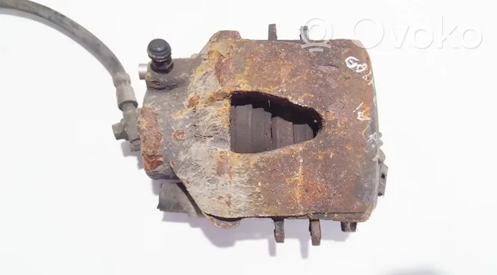 Volkswagen Golf VI Front brake caliper 