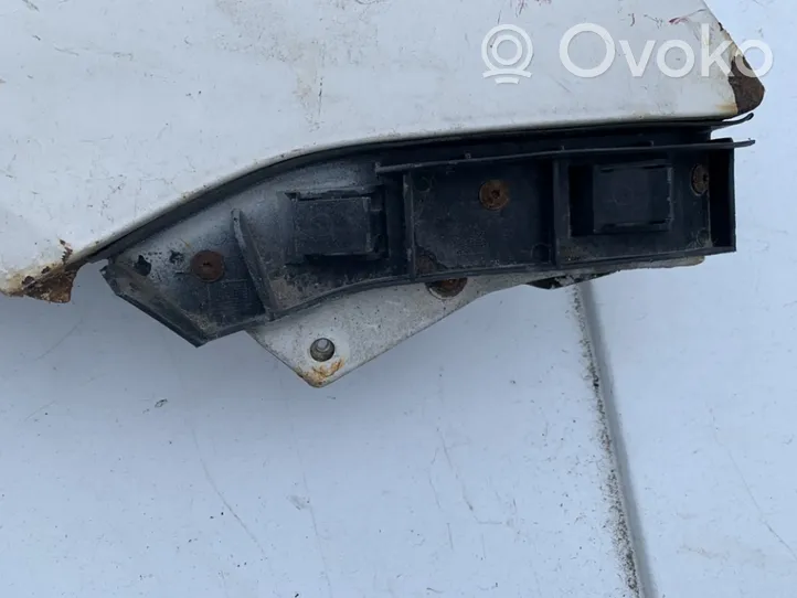 Volkswagen Polo Uchwyt / Mocowanie zderzaka przedniego 6q0807184