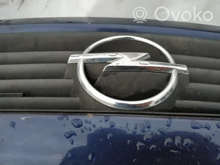 Opel Astra G Mostrina con logo/emblema della casa automobilistica 