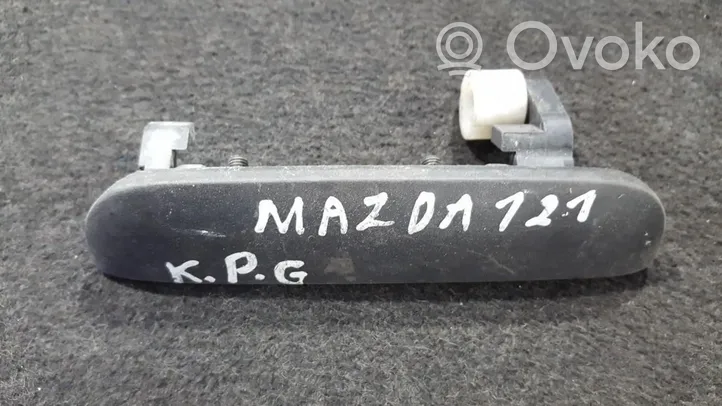 Mazda 121 Klamka zewnętrzna drzwi 