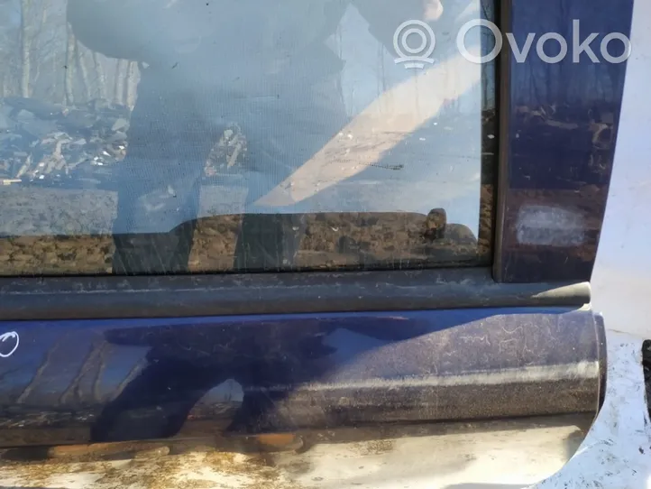 Opel Astra G Takaoven lasin muotolista 