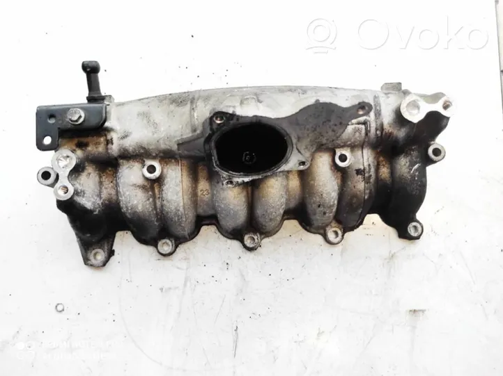 Volkswagen PASSAT B6 Exhaust manifold 03G129713