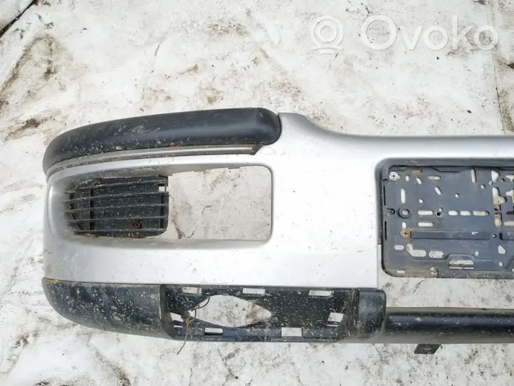Opel Omega B1 Передний бампер pilkas