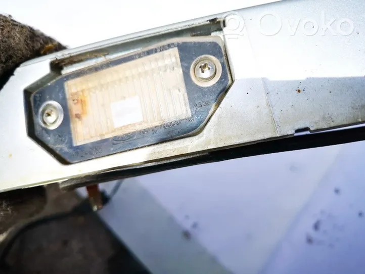 Ford Mondeo Mk III Lampa oświetlenia tylnej tablicy rejestracyjnej 1s7113550ac