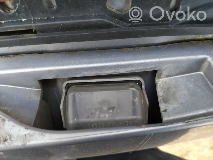 Mazda CX-7 Lampa oświetlenia tylnej tablicy rejestracyjnej 