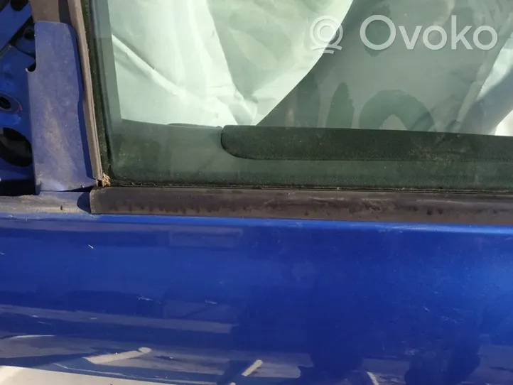 Renault Megane II Priekinių durų stiklo apdaila 