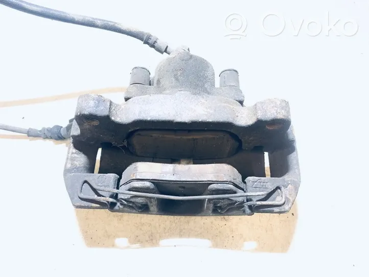 Volkswagen Jetta VI Front brake caliper 