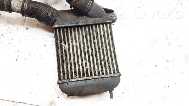 Renault Espace II Chłodnica powietrza doładowującego / Intercooler 7700752904