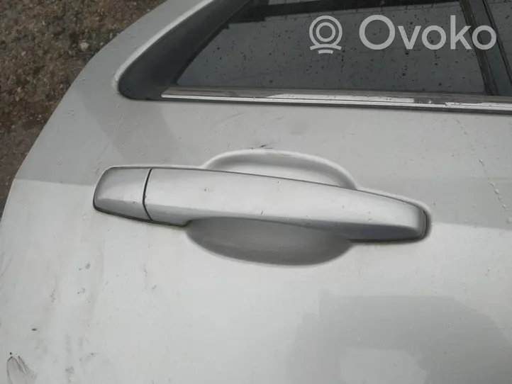 Cadillac SRX Front door exterior handle 