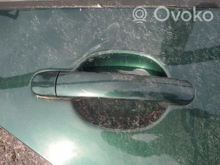 Opel Zafira B Front door exterior handle 