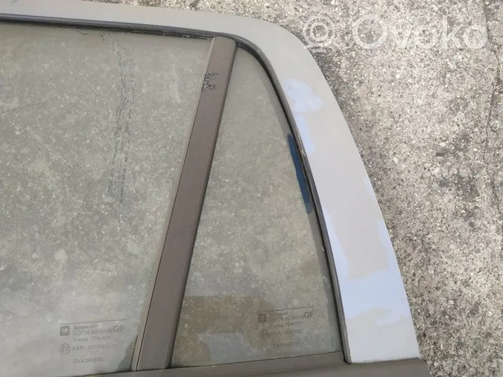 Opel Astra G Rear vent window glass 