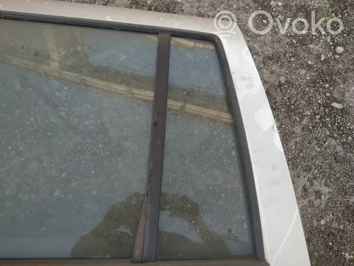 Volkswagen Golf IV Rear vent window glass 