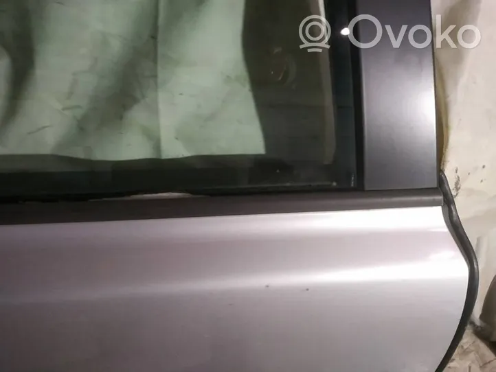 Volvo V50 Rear door glass trim molding 