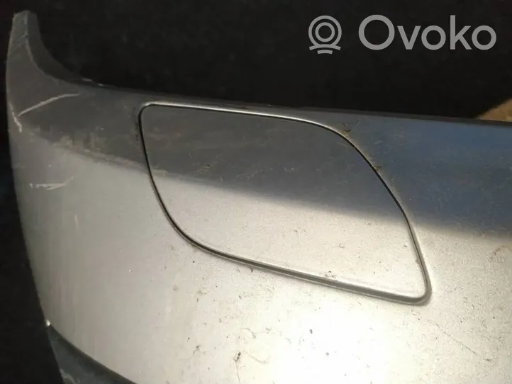 Opel Astra H Zaślepka spryskiwacza lampy przedniej 