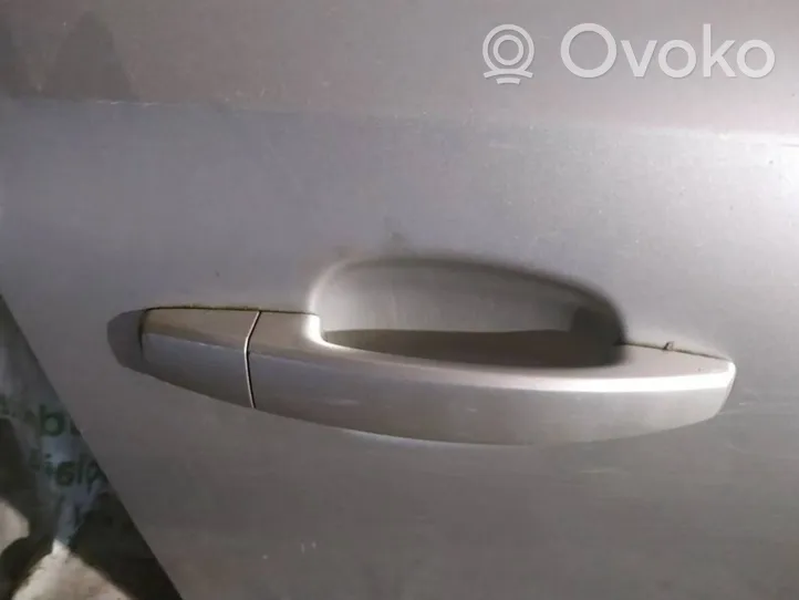 Opel Astra H Front door exterior handle 