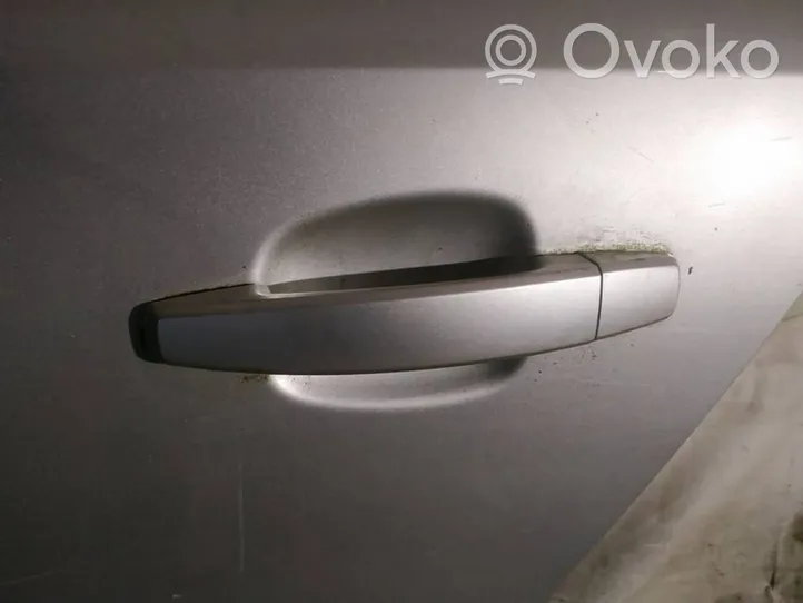 Opel Astra H Front door exterior handle 