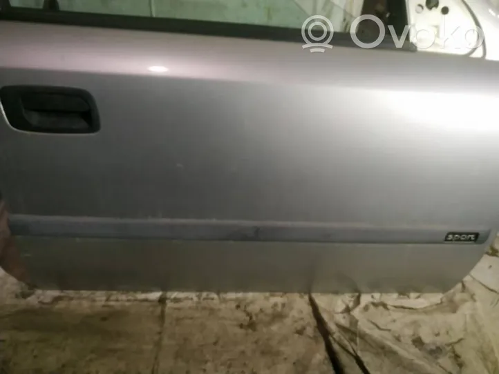 Opel Astra G Rivestimento della portiera anteriore (modanatura) 