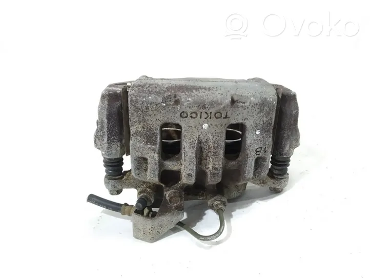 Mitsubishi L200 Caliper de freno delantero 