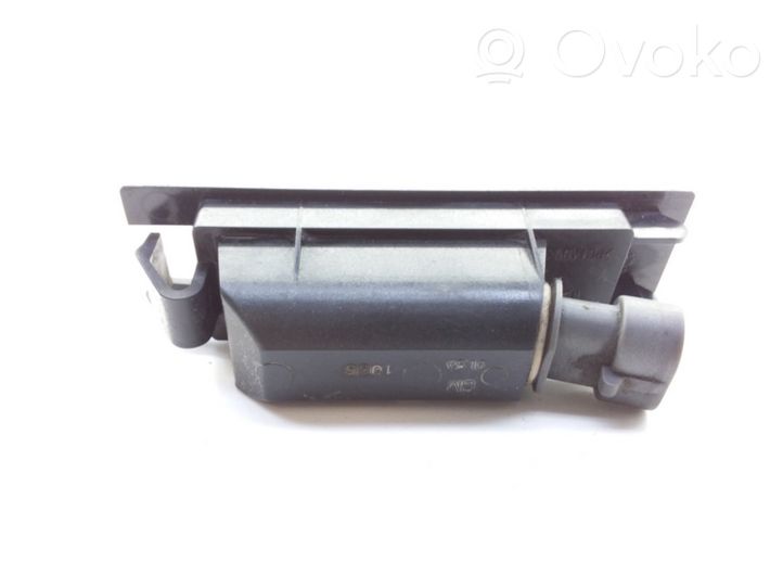 Opel Astra H Lampa oświetlenia tylnej tablicy rejestracyjnej 13139990