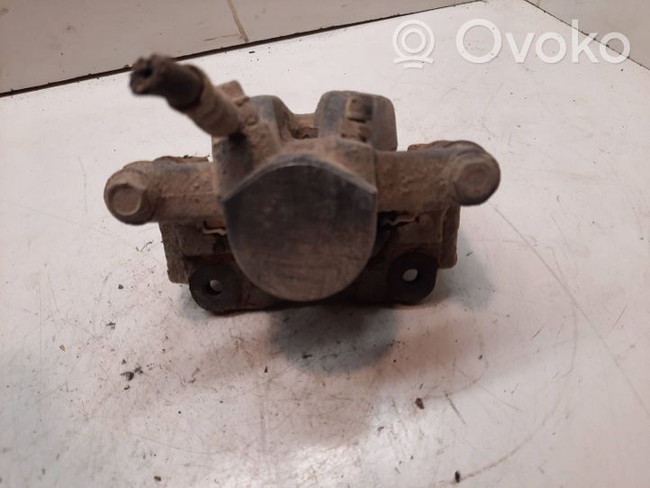 Toyota Avensis T250 Caliper del freno trasero Y01340