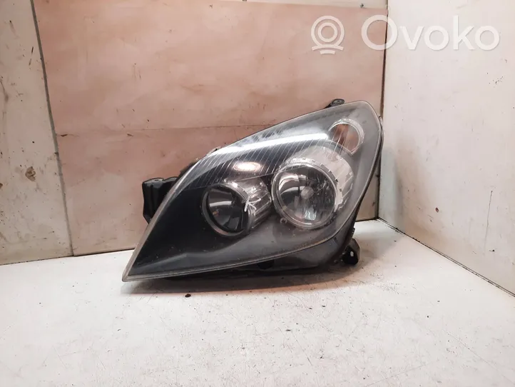 Opel Astra H Lampa przednia 1EG27037031