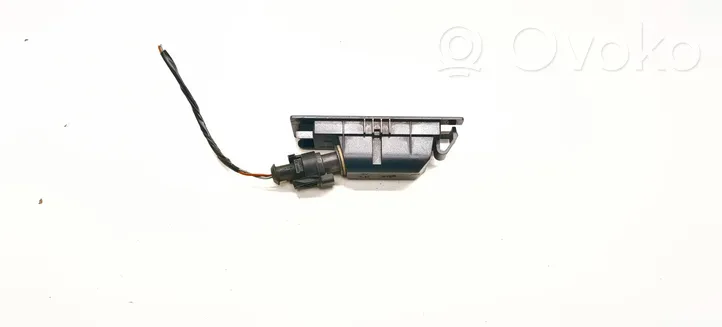 Opel Astra H Lampa oświetlenia tylnej tablicy rejestracyjnej 13139990