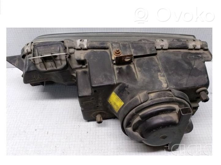 Ford Scorpio Headlight/headlamp 85GG13060AA