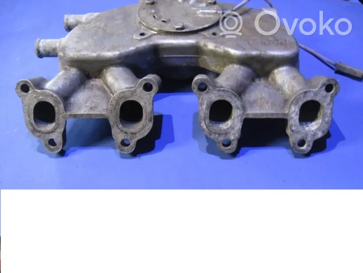 Volkswagen Golf II Intake manifold 038129713K