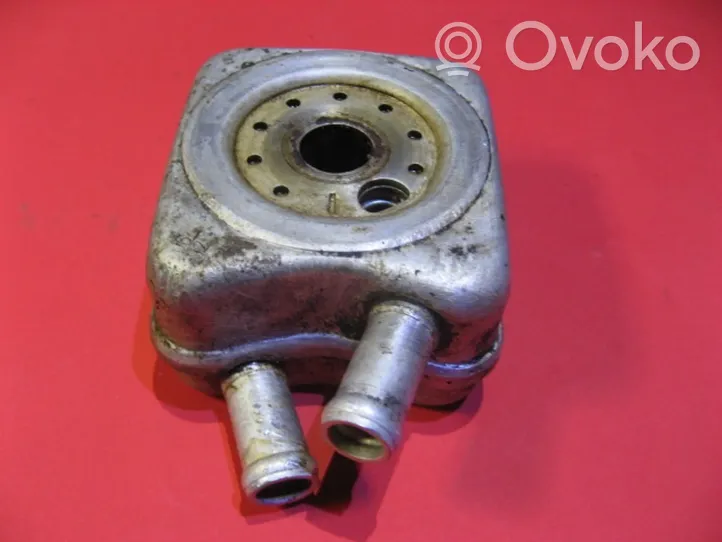 Volvo 340 -  360 Mocowanie / uchwyt filtra oleju 028117021K