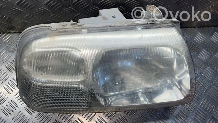 Suzuki Grand Vitara I Phare frontale 10032078