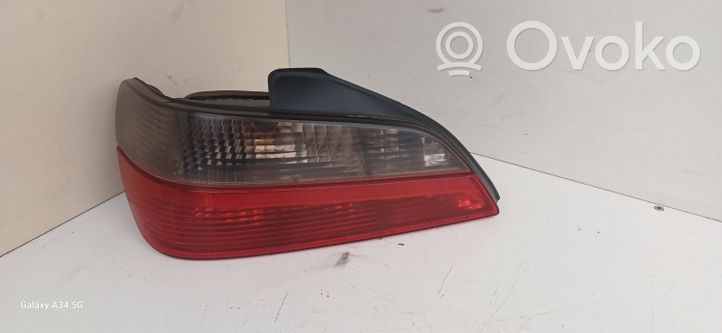 Peugeot 406 Takavalon polttimon suojan pidike 2255G