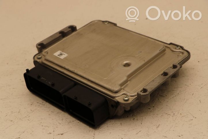 KIA Carens III Engine control unit/module 0281019595