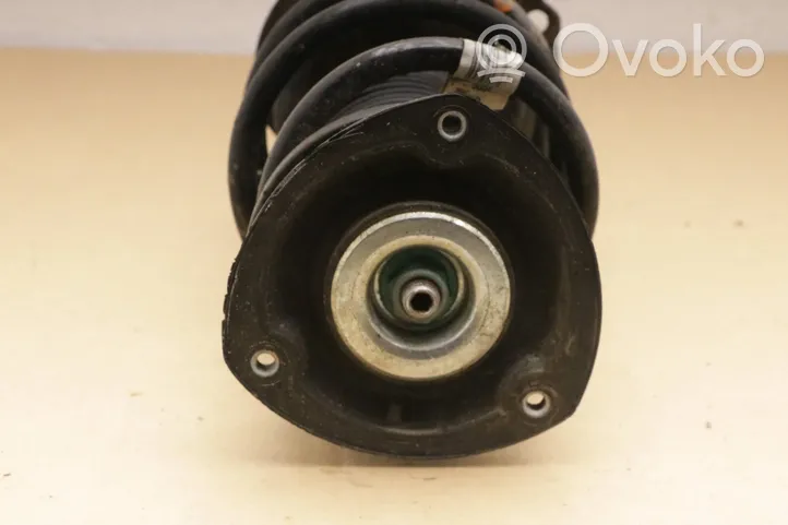 Volkswagen Golf VII Front shock absorber with coil spring 5Q0413023FM