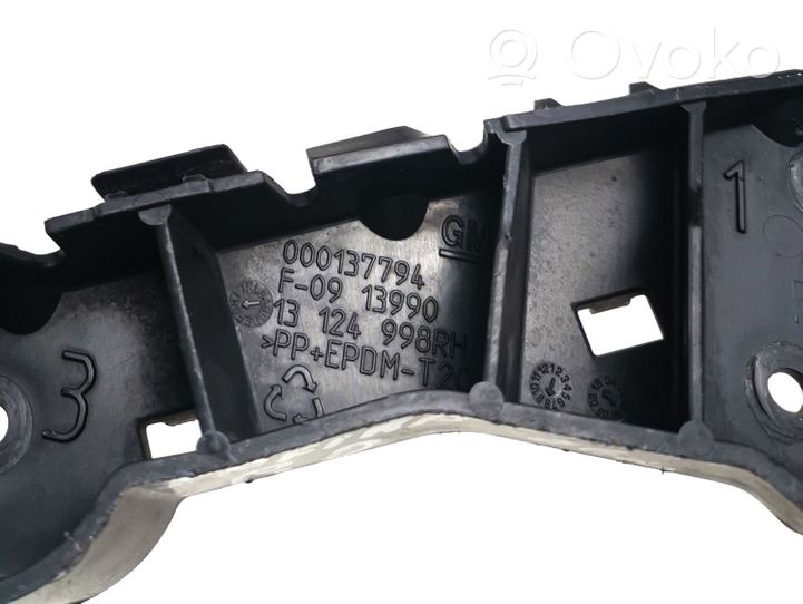 Opel Zafira B Support de montage de pare-chocs avant 13124998