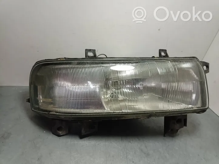 Opel Movano A Lampa przednia 7700352104-E