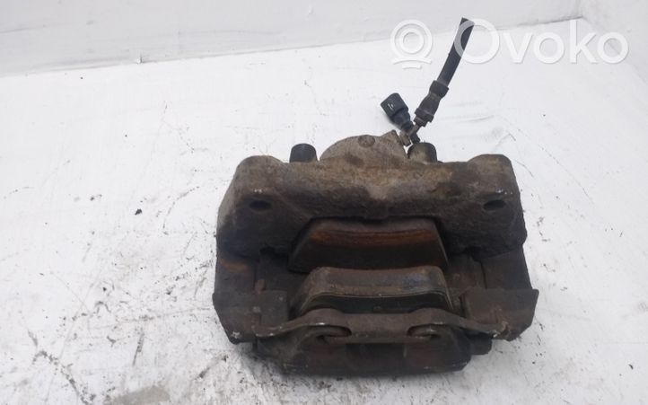 Volkswagen Touareg I Front brake caliper 7L6106D