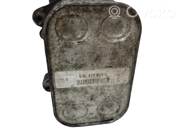 Volkswagen Golf VI Supporto di montaggio del filtro dell’olio 70346682