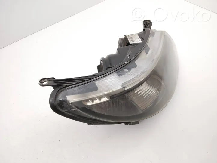 Saab 9-3 Ver2 Lampa przednia 12770138