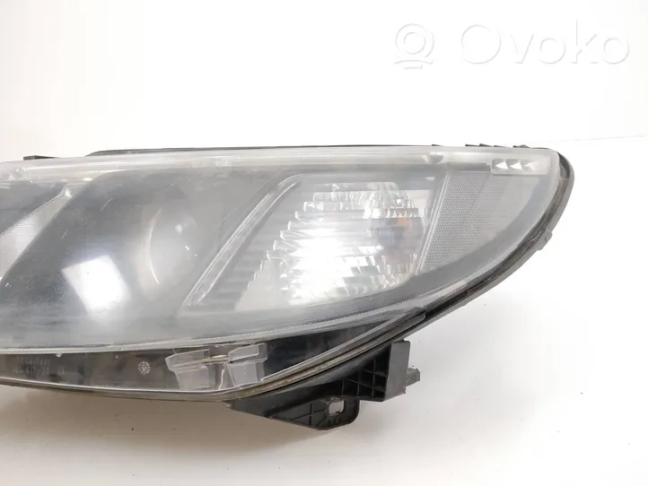 Saab 9-3 Ver2 Lampa przednia 12770137