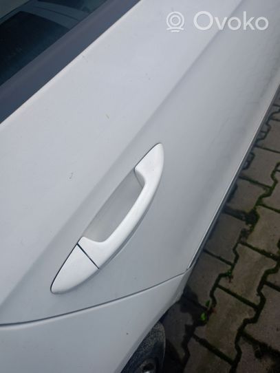 Volkswagen PASSAT B6 Poignée extérieure de porte arrière 