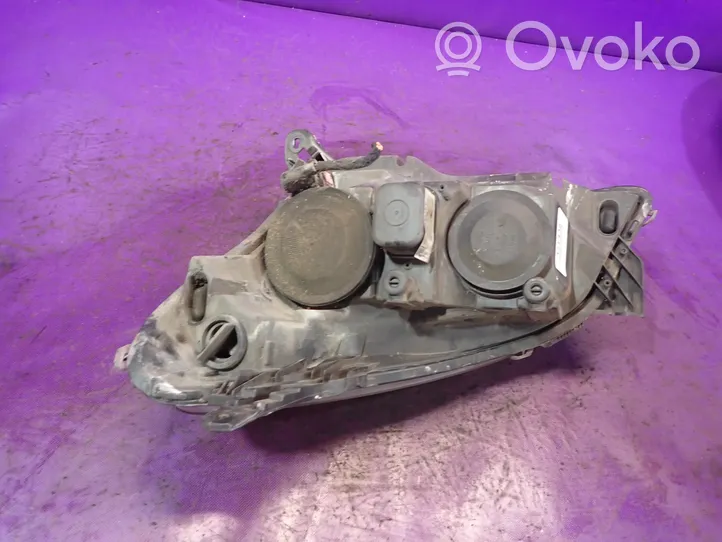 Opel Astra H Lampa przednia 13239289RH