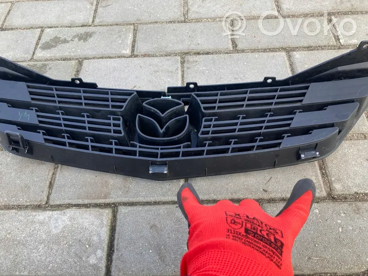 Mazda 626 Griglia superiore del radiatore paraurti anteriore GG2M50712