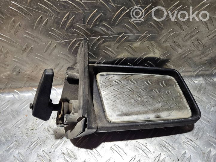 Volvo 340 -  360 Specchietto retrovisore manuale 008305