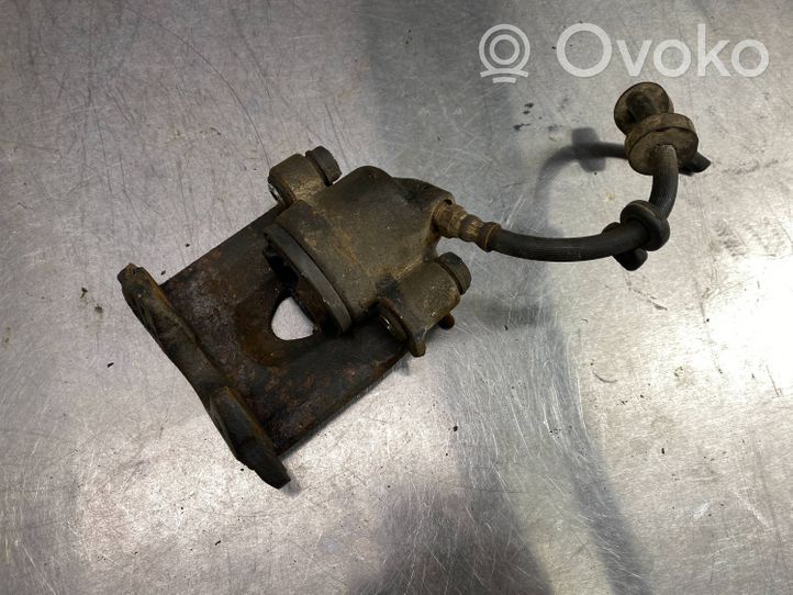 Volkswagen Golf II Front brake caliper 