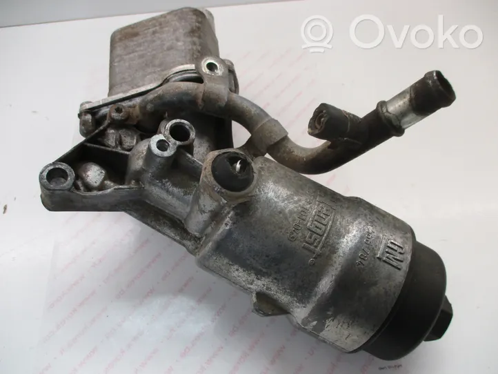 Opel Astra J Supporto di montaggio del filtro dell’olio 55566784